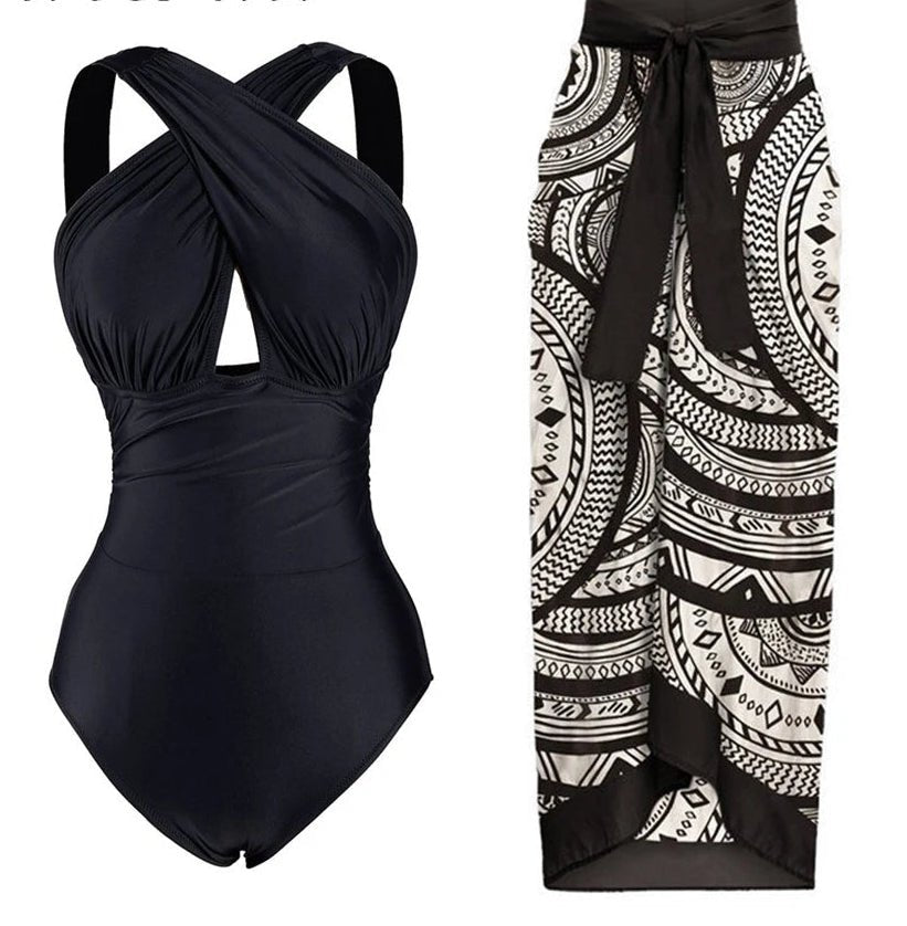 Conjunto de Enteriza Negra Lisa y Falda Pareo Estampada Ref. 0561 - Marea Bella Swimwear