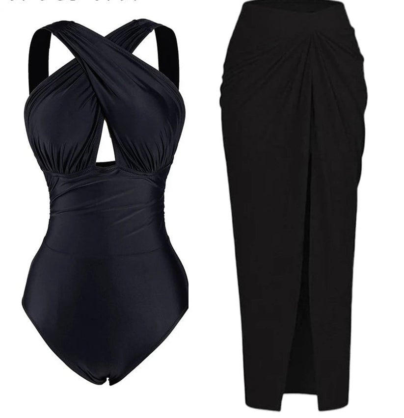 Conjunto de Enteriza Negra Lisa y Falda Pareo Estampada Ref. 0561 - Marea Bella Swimwear
