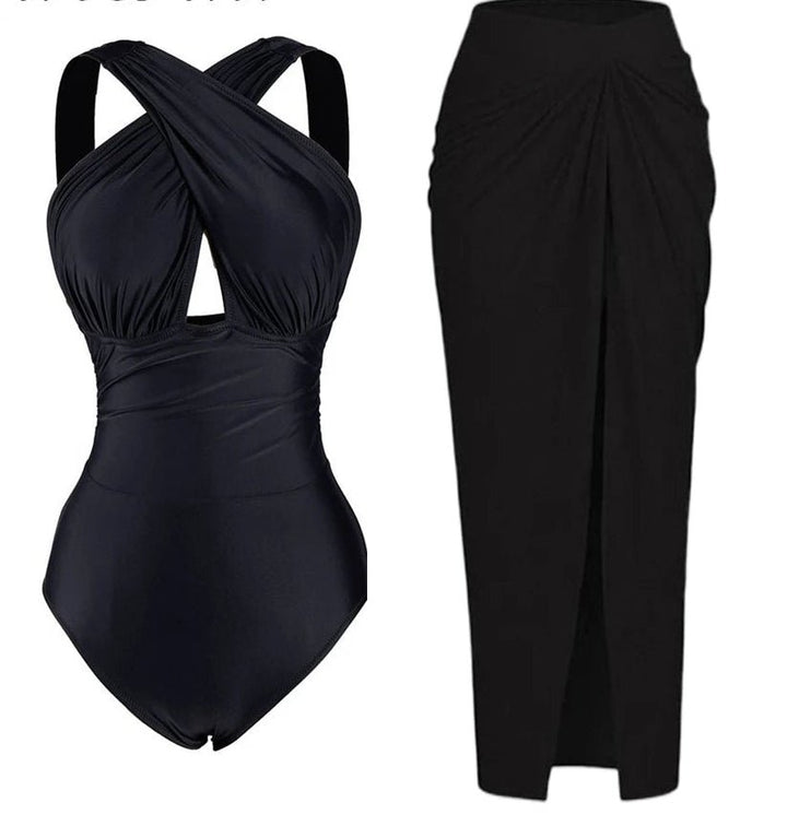 Conjunto de Enteriza Negra Lisa y Falda Pareo Estampada Ref. 0561 - Marea Bella Swimwear