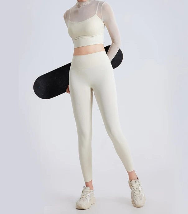 Conjunto Deportivo con Top de Manga Larga en Tul y Calza Ref. 1040 - Marea Bella Swimwear